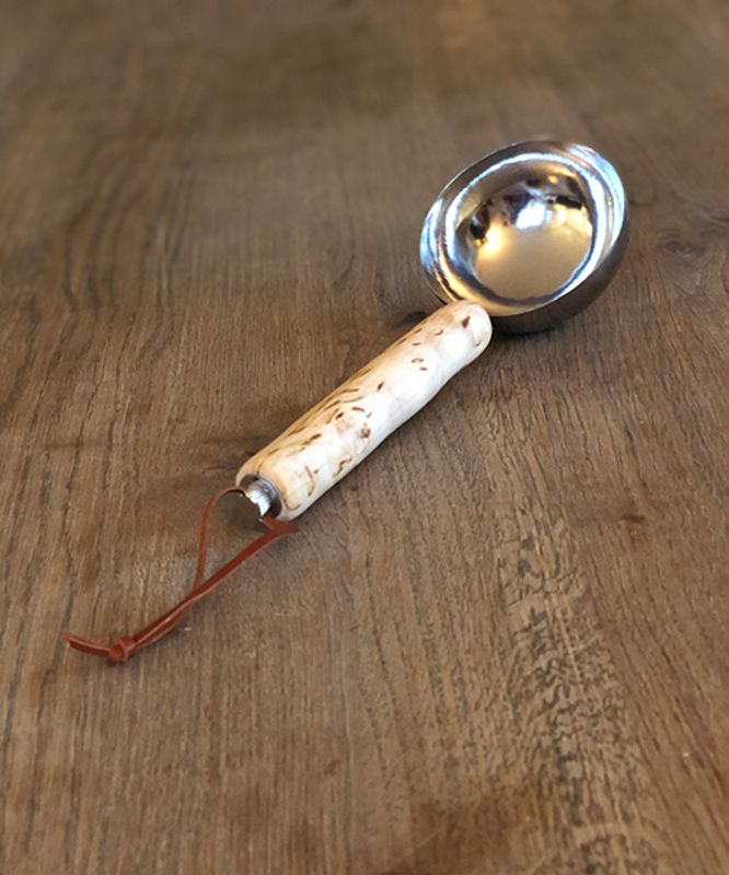 Justerbar øse